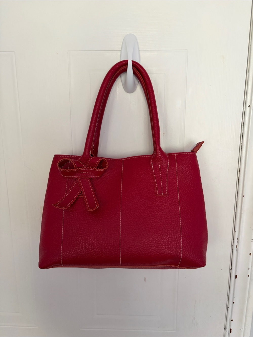 Red Leather Tote Handbag with Decorative Bow